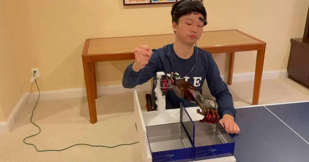 A teenager who invented an artificial hand that can be controlled by the mind